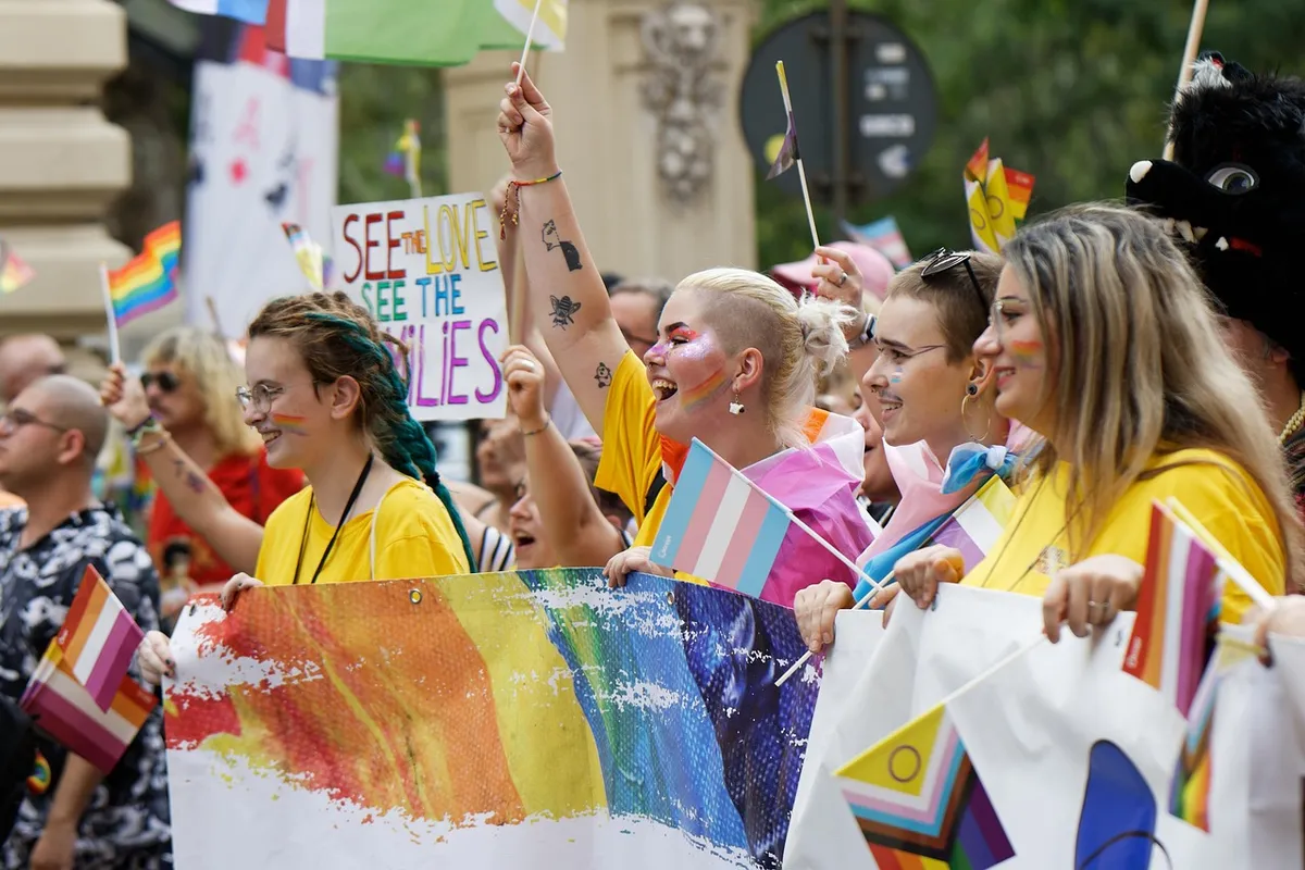people, ladies, girls, colors, flags, advocacy, event, pride, parade, mark, the street, urban, town, community, cheerfulness, exuberance, claim, rights, physiog